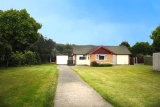 Front and drive view of the bungalow