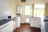 Fully fitted kitchen with appliances