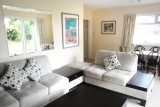 The spacious lounge area with flat screen TV